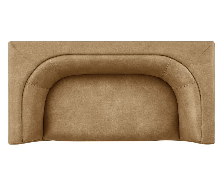Natalia Toast Premium Vegan Leather Loveseat Brown leather sofa with a blue pillow in a living room setting.