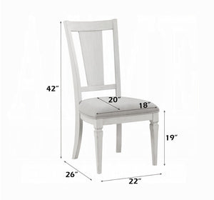 A white wooden dining chair with a light gray upholstered seat, shown with dimension lines and labels indicating its height, width, and depth measurements.