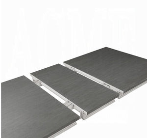 Three dark gray wood-look panel flooring pieces shown at an angle on a white background, revealing the silver metal mounting frames.