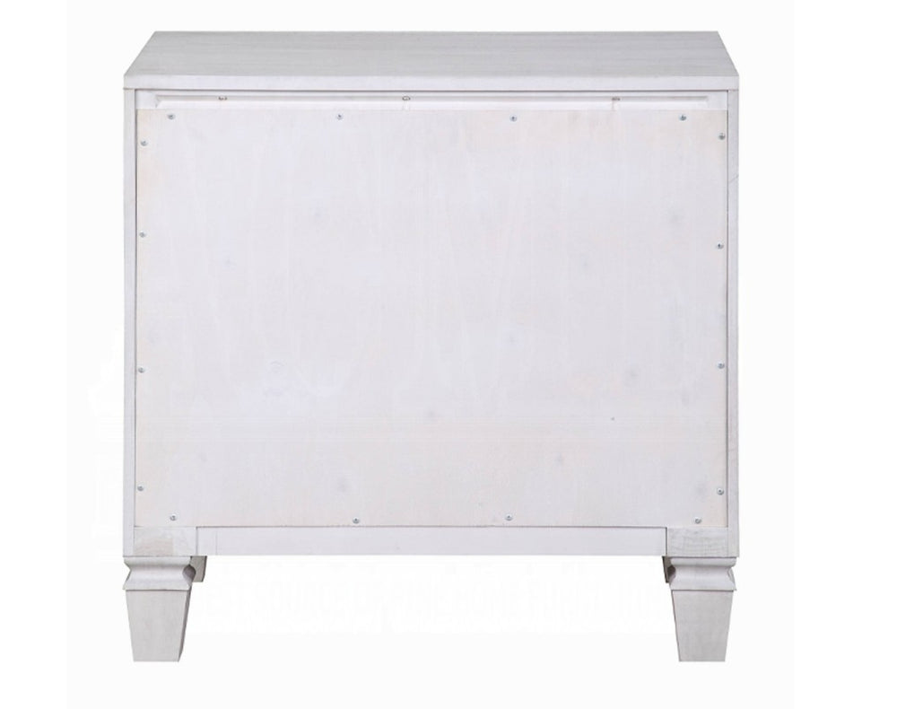 Natasha Two Tone Light Gray Nightstand A white two-drawer nightstand with textured gray drawer fronts and small dark diamond-shaped pulls, styled in a bedroom setting with a table lamp, books, and flowers on top.