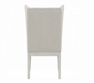 A high-back dining chair with a diamond-quilted upholstered backrest and a light-colored wooden frame, shown from the front on a white background.