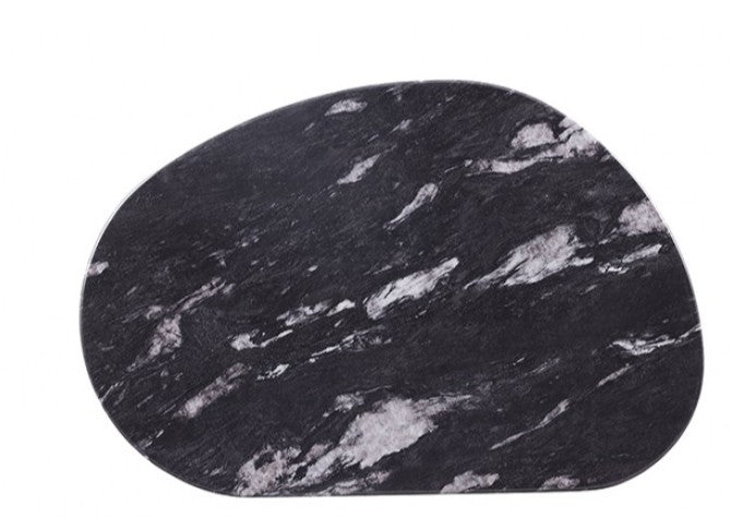 Naynem Coffee Table Oval Sintered Stone Black White Gold Finish An oval coffee table with a dark black and white marble top and two cylindrical gold metal legs, set on a light beige tiled floor.