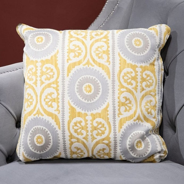 Nikki Gray Button Tufted Sofa Decorative pillow with yellow and gray pattern on a gray sofa