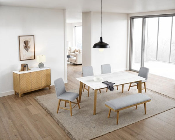 Nolan Genuine Marble Top Rectangular Dining Table Modern dining room with a white table, gray chairs, and wooden sideboard.