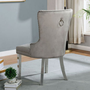 Noonwit Chrome Silver Flannelette Fabric Chair Gray velvet chair with metal legs in a room with a plant and books.