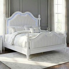 Octavia Victorian Style Pearl White Bed White bed with decorative headboard in a bedroom setting