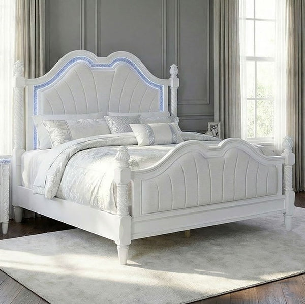 Octavia Victorian Style Pearl White Bed White bed with decorative headboard in a bedroom setting
