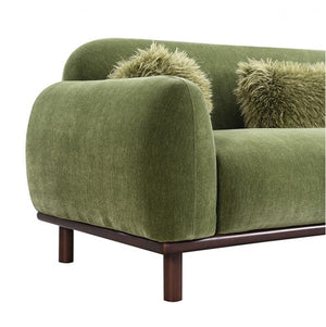 Owan Fabric Sofa With Pocket Coil Seating – Olive Green Green sofa with wooden legs on a white background