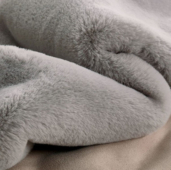 Patricia Power Loomed Modern Silver Area Rug Material  Close-up of a fluffy gray blanket