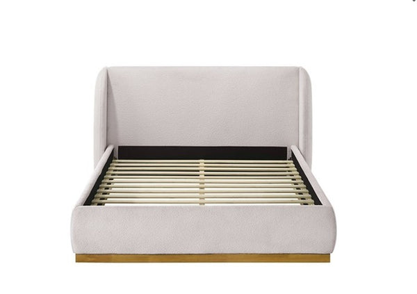 Pirewin Boucle Fully Upholstered Wingback Gold Plinth Base Bed Beige upholstered bed with wooden slats on a white background