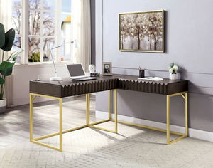 Primberg Walnut Two Tone Corner Desk-Closed L-shaped computer desk with a dark brown wood-grain top and gold metal legs, styled in a modern home office setting.