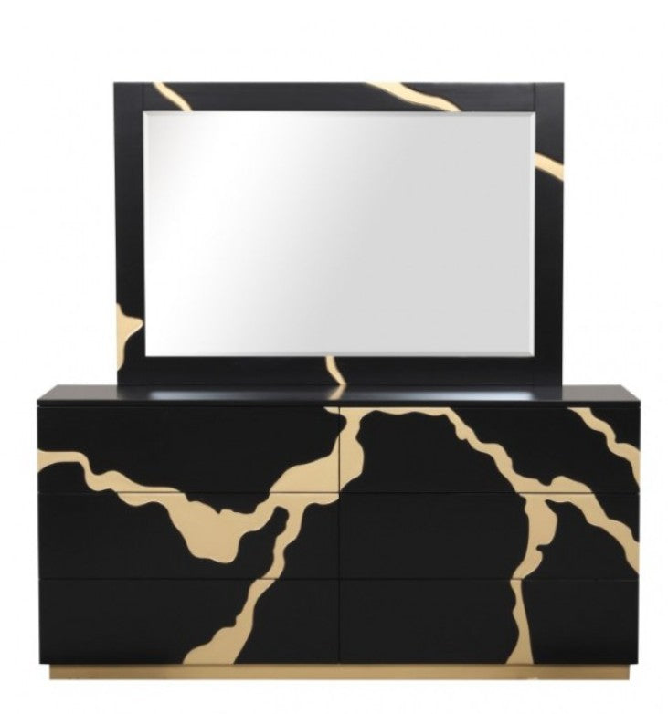 Primeberg Modern Black Gold Pattern Dresser A modern black and gold dresser with a matching mirror, styled in a contemporary room with a concrete wall and a window view.