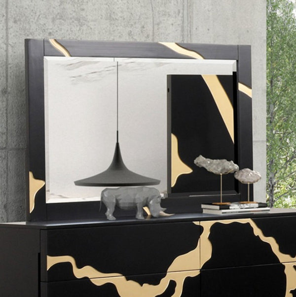 Primeberg Modern Black Gold Pattern Dresser A modern black and gold marbled dresser with a matching mirror, styled with a gray elephant figurine and small decorative objects on top, set against a concrete wall.