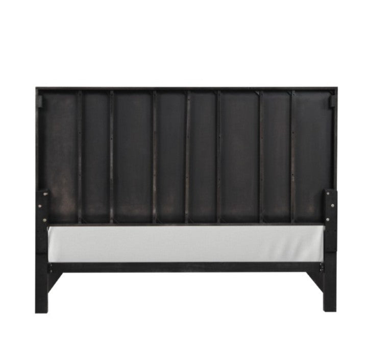 Primeberg Modern Black Pattern Bed Modern bedroom with black and gold furniture against a marble wall.