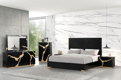 Primeberg Modern Black Pattern Bed Modern bedroom with black and gold furniture against a marble wall.