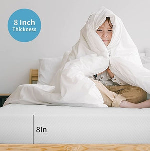 Primenite Memory Foam Mattress 8" A child sitting on a bed wrapped in a thick white duvet or comforter, with text overlays indicating an 8-inch thickness. The scene is set in a bright, minimalist bedroom.