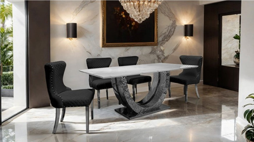 Primenova Upholstered Silver Black Dining Chair Black quilted chair with silver legs on a white floor and light gray walls