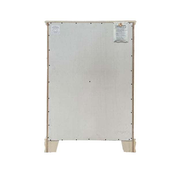 Primrose Gray Chest with Floral Accent The back view of a tall, rectangular appliance, likely a refrigerator or freezer, showing a large metallic silver back panel with mounting holes, stickers, and beige plastic feet at the bottom, isolated on a white background.