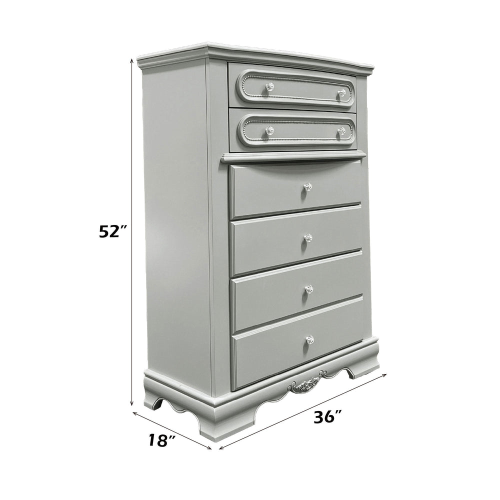 Primrose Gray Chest with Floral Accent A tall, narrow gray wooden chest of drawers with five drawers, featuring ornate drawer pulls and decorative molding on a plain white background.