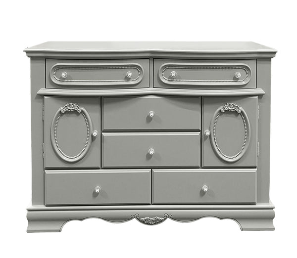Primrose Gray Dresser with Floral Accent A classic-style gray wooden dresser with ornate carved details, oval cabinet doors, and multiple drawers, shown against a plain white background.