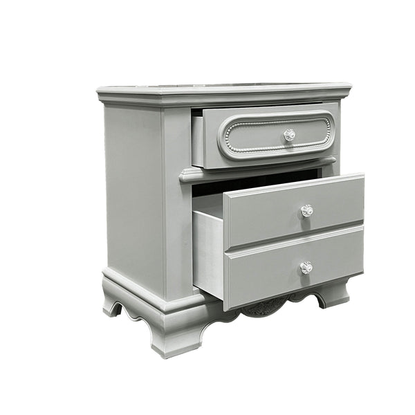 Primrose Gray Nightstand with Floral Accent A light gray painted nightstand with two drawers, one closed and one open, featuring decorative drawer fronts and small round silver knobs, shown on a plain white background.