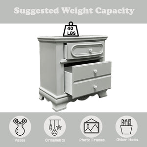 Primrose Gray Nightstand with Floral Accent A light gray two-drawer nightstand shown on a white background with a gray header and footer. The top header reads 'Suggested Weight Capacity' with a '40 LBS' weight icon placed above the furniture.