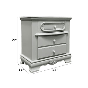 Primrose Gray Nightstand with Floral Accent A light gray three-drawer nightstand with decorative molding and silver knobs, shown with dimension lines indicating 27 inches tall, 17 inches wide, and 26 inches deep on a white background.