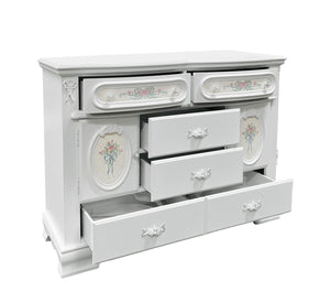 Primrose White Dresser with Floral Accent A white painted wooden dresser with multiple drawers and decorative floral oval panels, shown on a plain white background.
