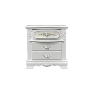 Primrose White Nightstand with Floral Accent A white ornate two-drawer nightstand with decorative floral detailing on the top drawer and silver metal handles, shown against a plain white background.