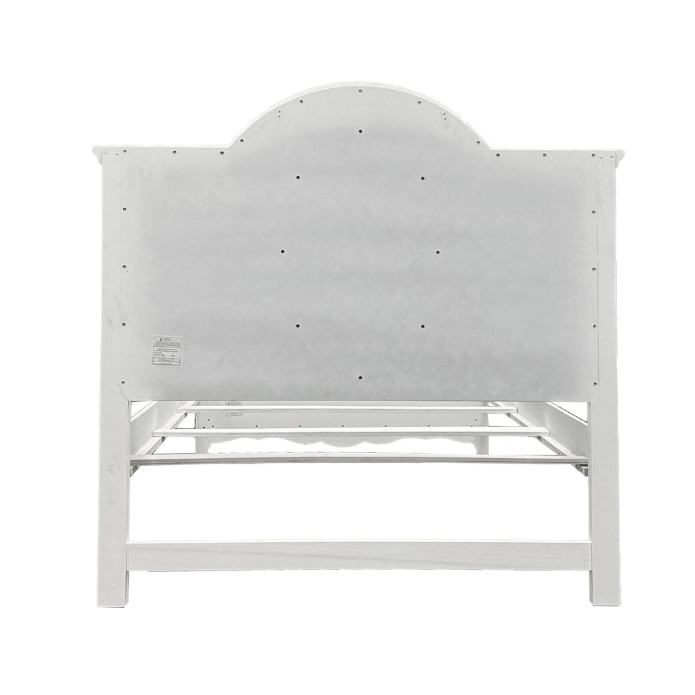 Primrose White Twin Bed Frame with Floral Accent Children's bedroom set with white bed, dresser, and nightstand against a blue wall.