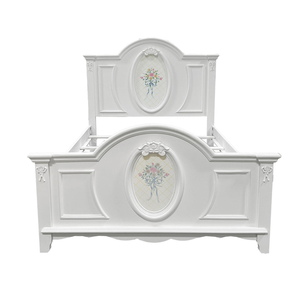Primrose White Twin Bed Frame with Floral Accent Children's bedroom set with white bed, dresser, and nightstand against a blue wall.