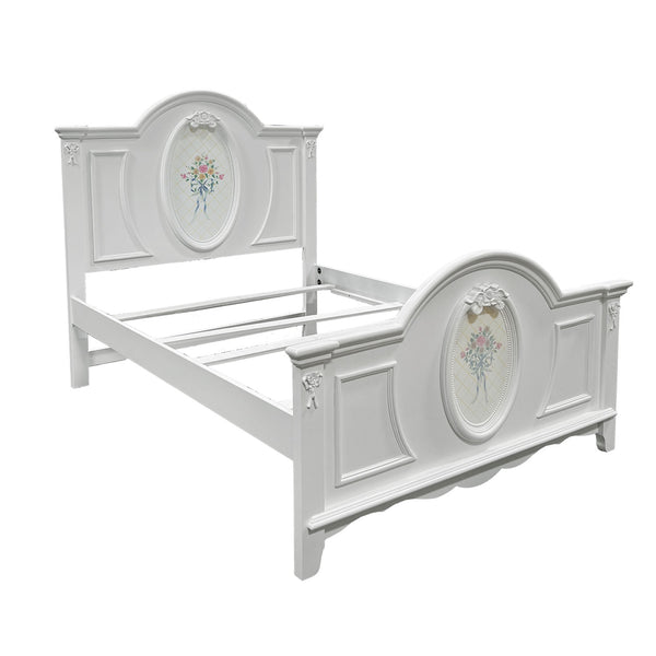 Primrose White Twin Bed Frame with Floral Accent White wooden bed with floral designs on a white background
