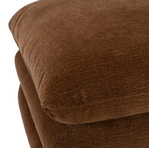 Prinkett Modular Corner Brown Fabric Ottoman Close-up of a brown textured fabric cushion or upholstered furniture surface on a white background.