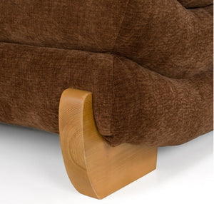 Prinkett Modular Corner Brown Fabric Sectional Sofa Close-up of a brown textured upholstered bed frame with a curved light wood footboard on a white background.