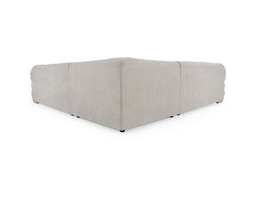 Prinkett Modular Corner Light Gray Sectional Sofa A light beige upholstered modular corner sofa section with a low, boxy design and small dark feet, shown on a plain white background.
