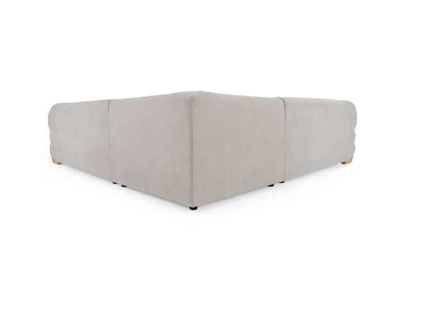 Prinkett Modular Corner Light Gray Sectional Sofa A light beige upholstered modular corner sofa section with a low, boxy design and small dark feet, shown on a plain white background.