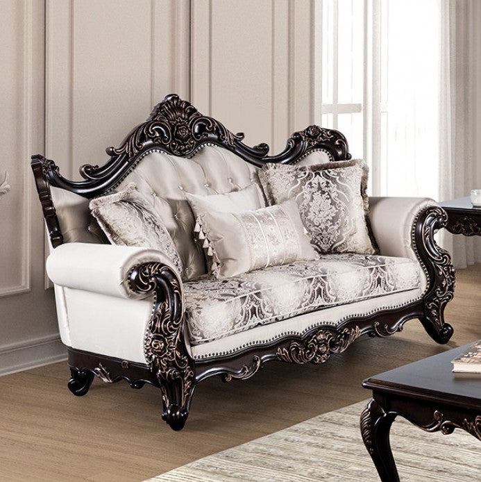Prisya Traditional Dark Cherry Beige Fabric Loveseat Decorative sofa with intricate carvings in a room with light-colored walls and wooden floor.