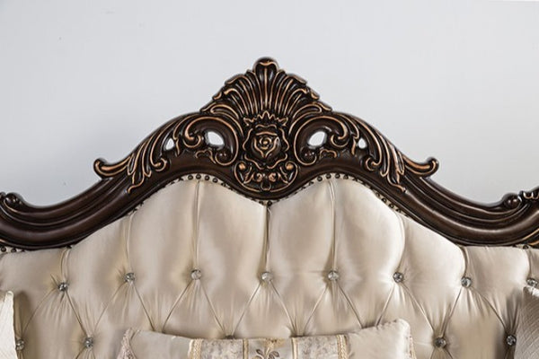 Prisya Traditional Dark Cherry Beige Fabric Sofa Decorative headboard with intricate carvings on a light background