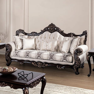 Prisya Traditional Dark Cherry Beige Fabric Sofa Decorative sofa with intricate carvings in a room with a neutral color scheme.