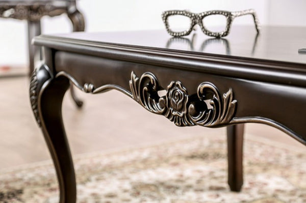 DPrisya Traditional Solid Wood Coffee Table ecorative table with intricate carvings and a pair of glasses on top.
