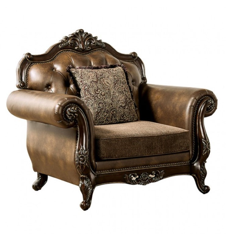 Priya Leatherette Fabric Button Tufted Chair Decorative brown armchair with intricate carvings and a patterned pillow on a white background