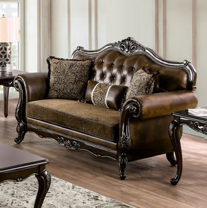 Priya Leatherette Fabric Button Tufted Loveseat Decorative brown sofa with ornate carvings in a living room setting.