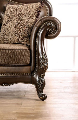Priya Leatherette Fabric Button Tufted Sofa Brown leather armchair with decorative patterns on a wooden floor.