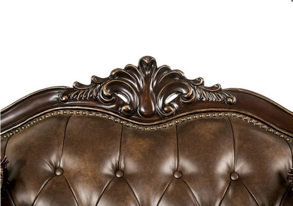 Priya Leatherette Fabric Button Tufted Sofa Close-up of an ornate brown leather headboard with intricate carvings.