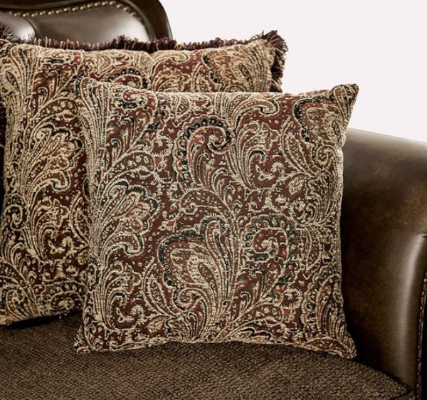 Priya Leatherette Fabric Button Tufted Sofa Decorative pillows with intricate patterns on a brown leather couch.