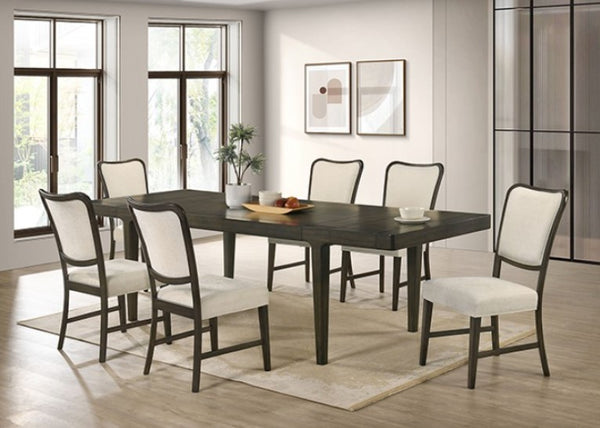 Dining room with a dark wooden table and white chairs in a well-lit room.