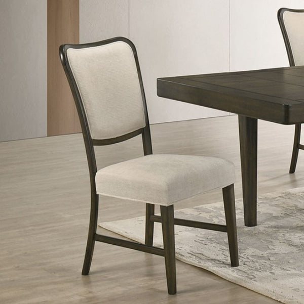 Quin Espresso Upholstered Fabric Dining Chair Dining chair with beige cushioned seat and backrest in a room with a wooden table.