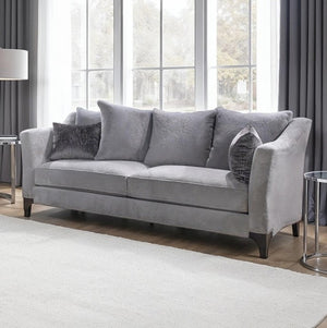 Risha Sloped Arm Light Gray Sofa Gray sofa with decorative pillows in a living room setting