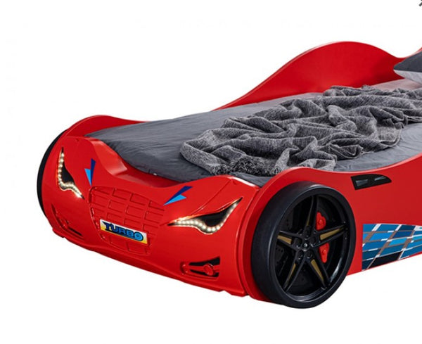 Ronny High Gloss Race Car Bed Red car-shaped bed with gray mattress on a white background