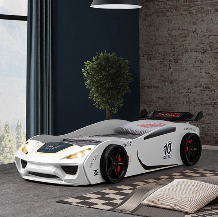 Rotvner Race Car-Bed With LED Headlights Children's car-shaped bed in a room with a window and plant